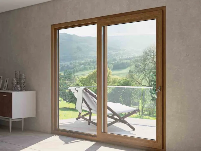 Schueco SoftSlide uPVC sliding door with oak-look finish